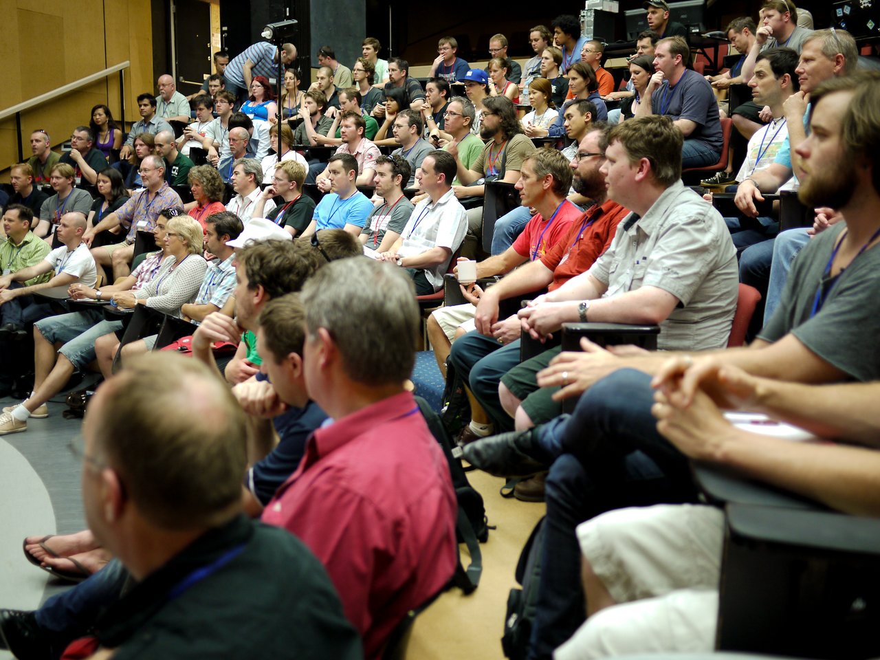 A large audience attentively listens during the Drupal Downunder conference in Australia, 2011.