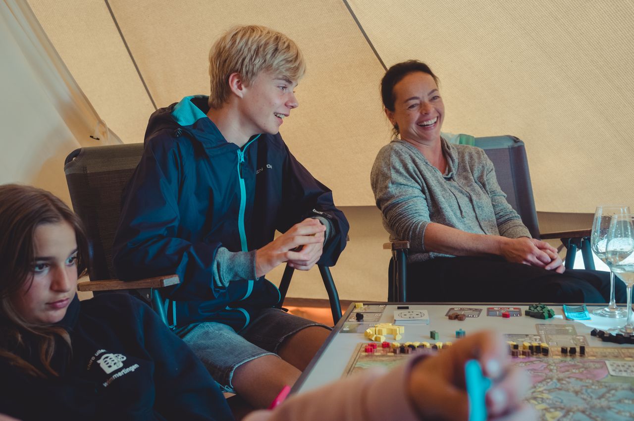 Playing board games in tent