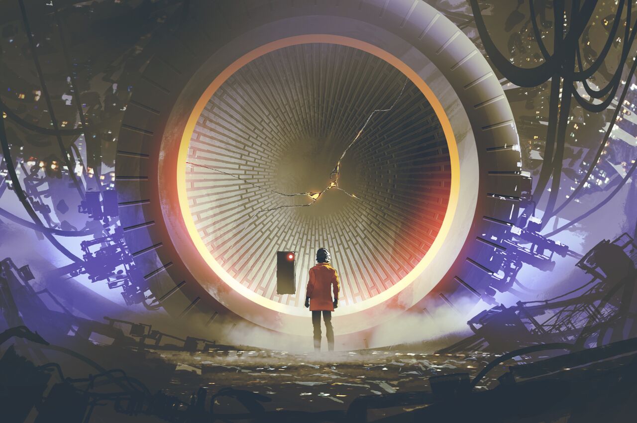 A person stands before a massive circular machine with cracks forming inside it, suggesting infrastructure under pressure.