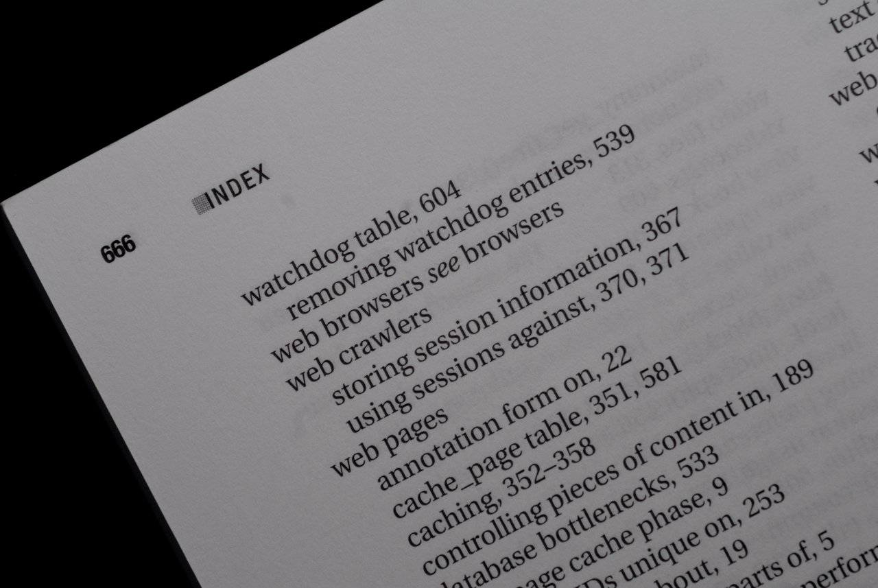 A close-up of the index page from the book "Pro Drupal Development", showing topics related to web development.