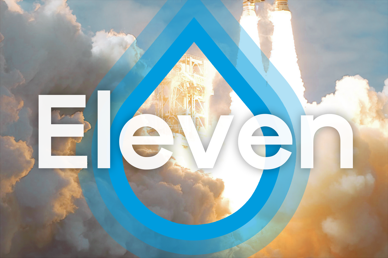 Drupal logo with the text "Eleven" and a rocket launch in the background.