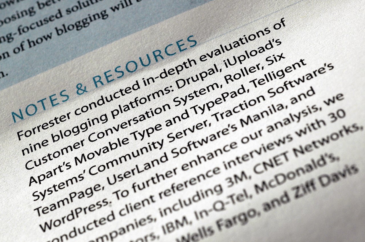 Close-up of a Forrester report evaluating blogging platforms, including Drupal, WordPress, and Movable Type.