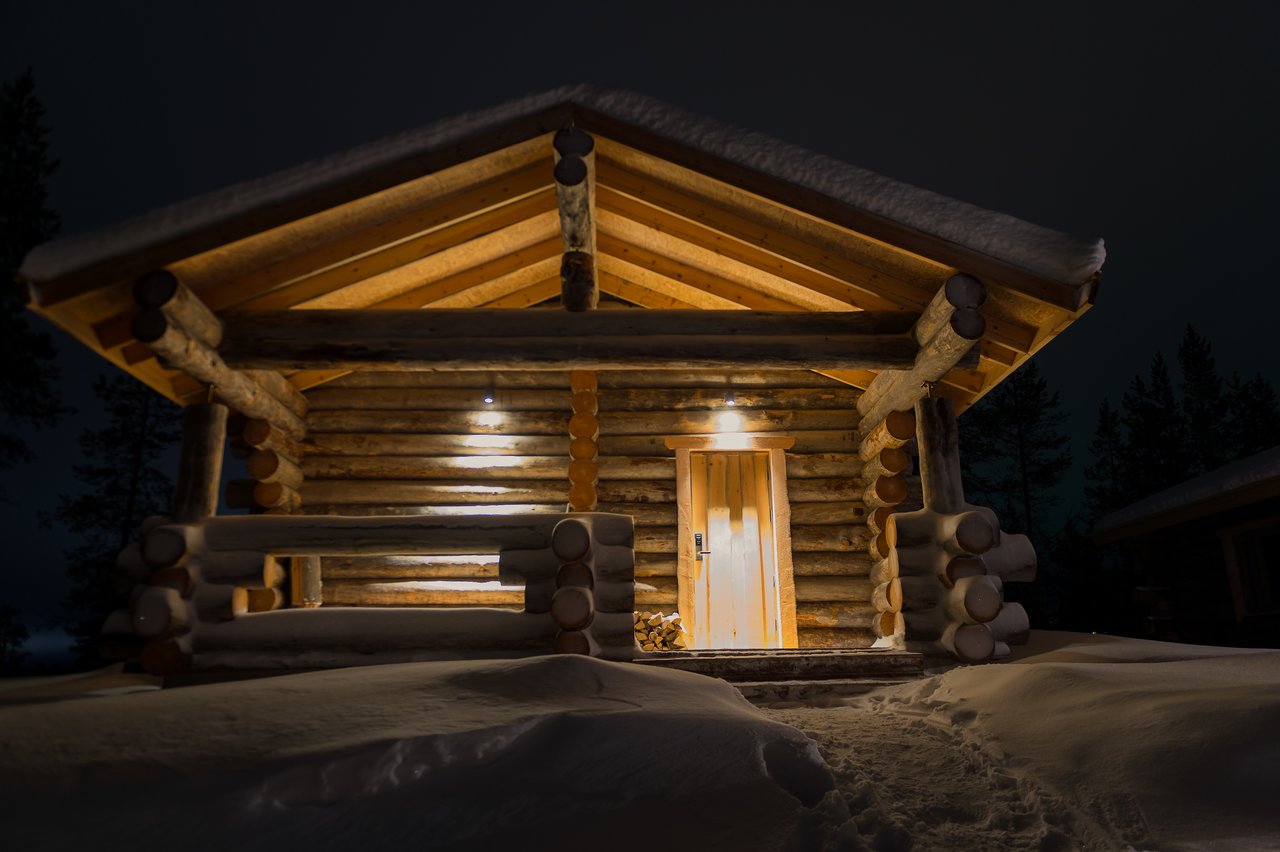 Log cabin by night