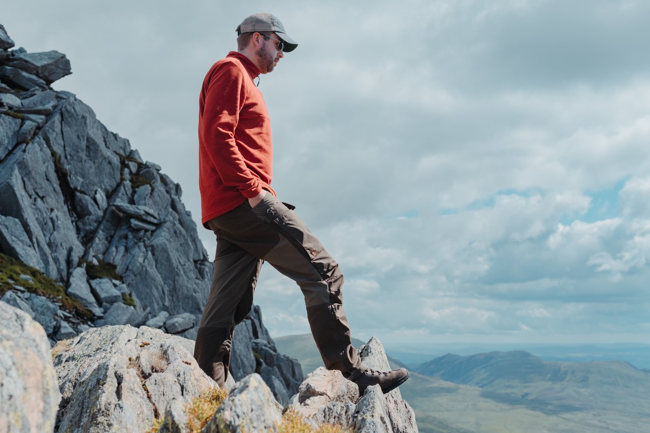 Dries standing on a cliff