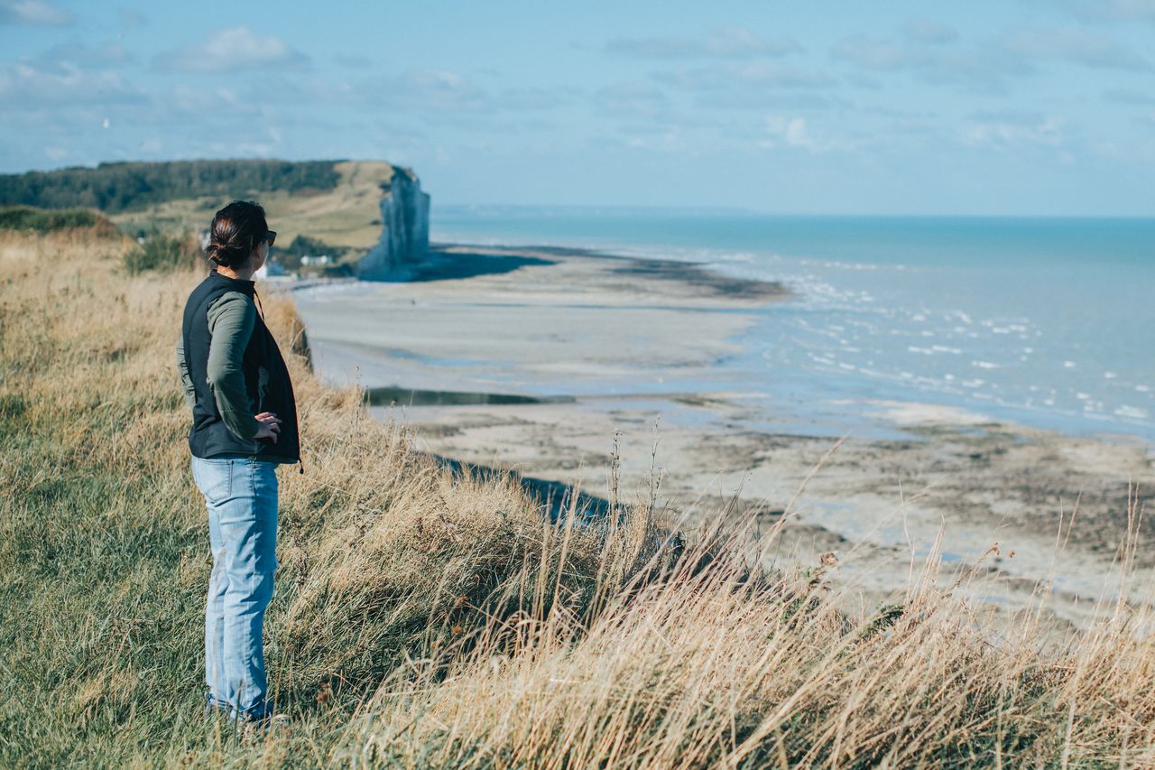 Vanessa overlooking the cliffs in Normandy