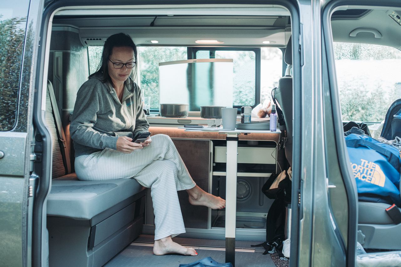 Vanessa sitting in the van