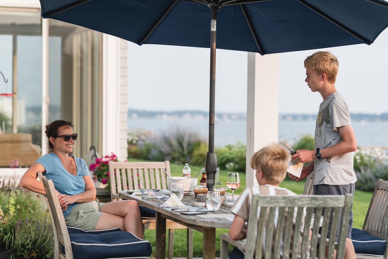 Eating dinner outside overlooking the ocean