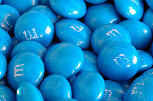 A close-up of blue m&m's only